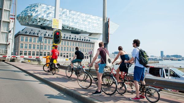 Friends on a bike at the Antwerp Port House