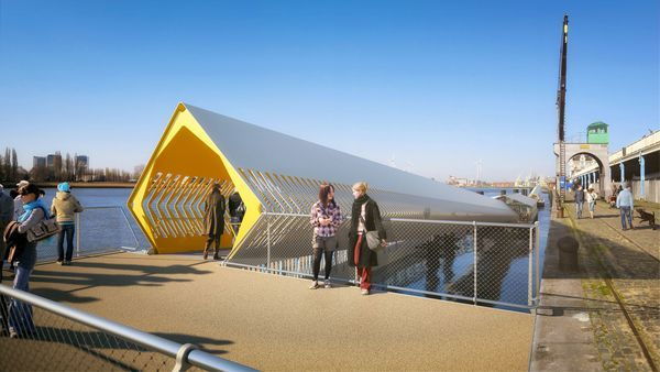 Some people stand at the entrance to a modern cruise terminal. In the background, the Scheldt River flows.