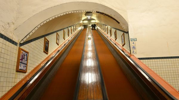 Wooden escalators in pedestrian tunnel