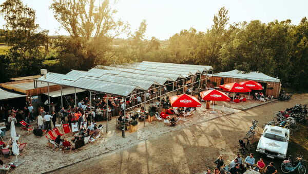 People enjoying themselves in the summer bar at the Regatta Club